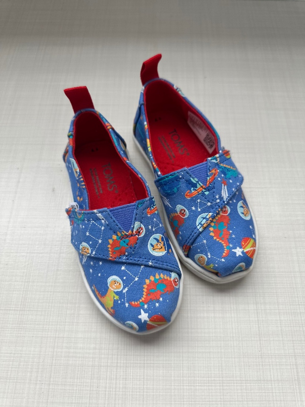 TOMS Ulm Alpargata Infants Shoes in Blue Dinos in Space Toddler 7 Velcro Slip On